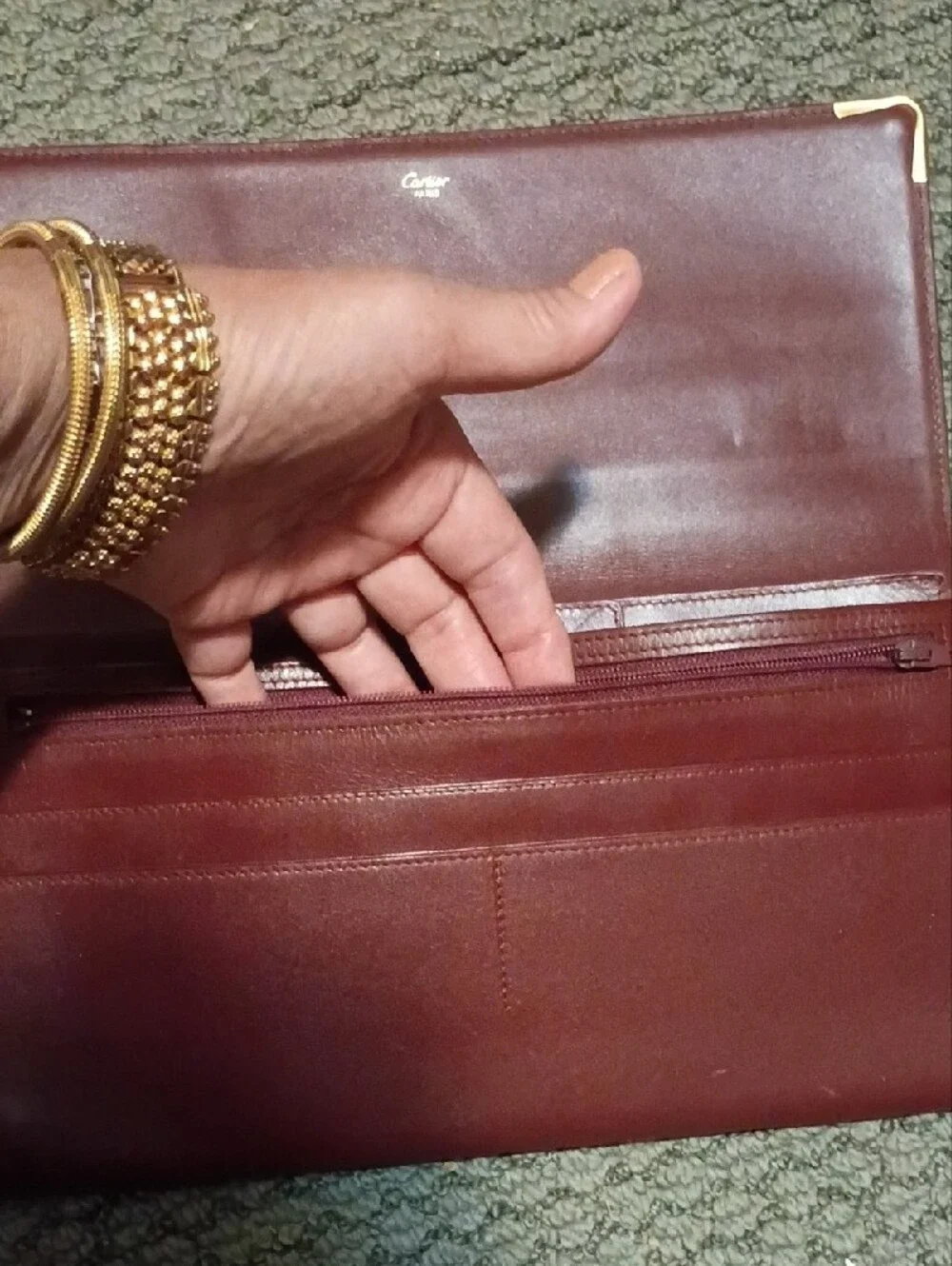 Cartier- Leather Fold-Over Clutch in Burgundy with Gold Accents